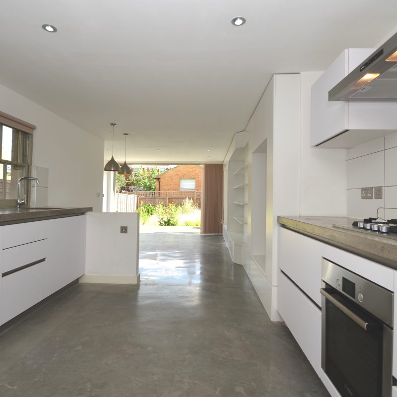 Solid,Polished,Concrete,Worktop,And,Solid,Polished,Concrete,Flooring